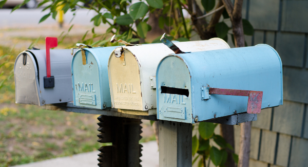Mailboxes in various stages of disrepair.